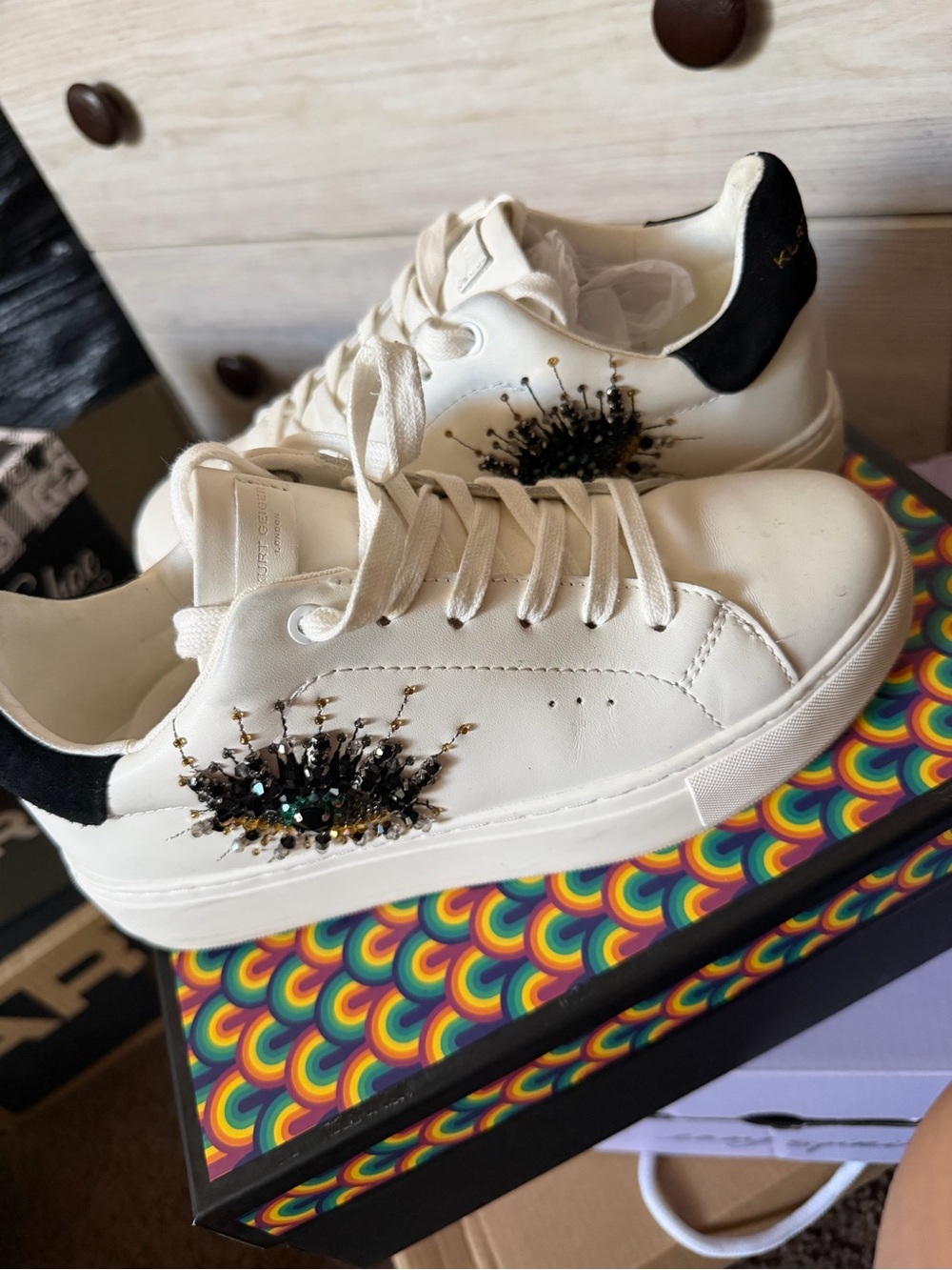 Kurt Geiger White Sneakers with Black Heel and Gold/Black Embellishment